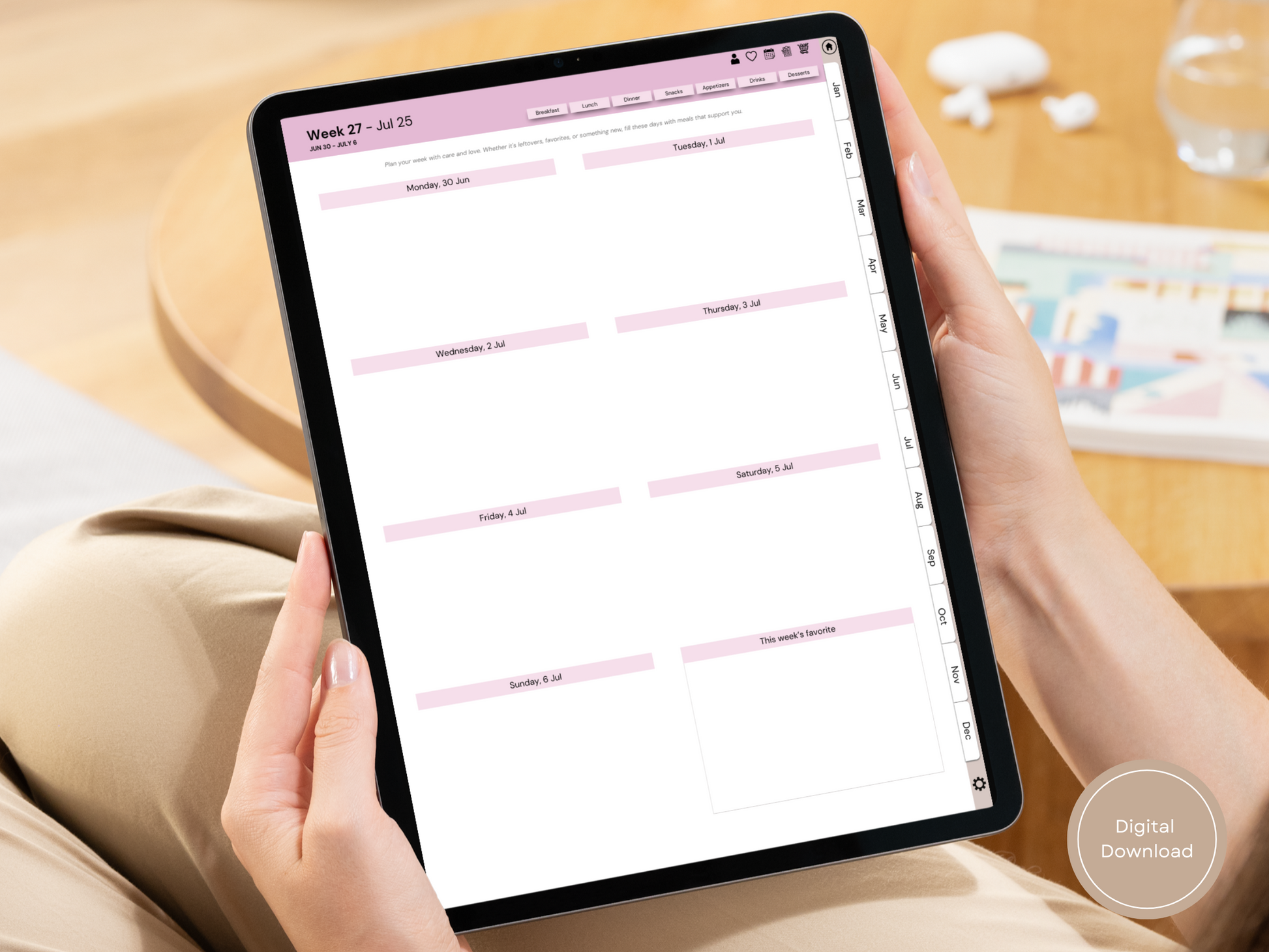 Person using the digital meal planner and recipe tracker on an iPad