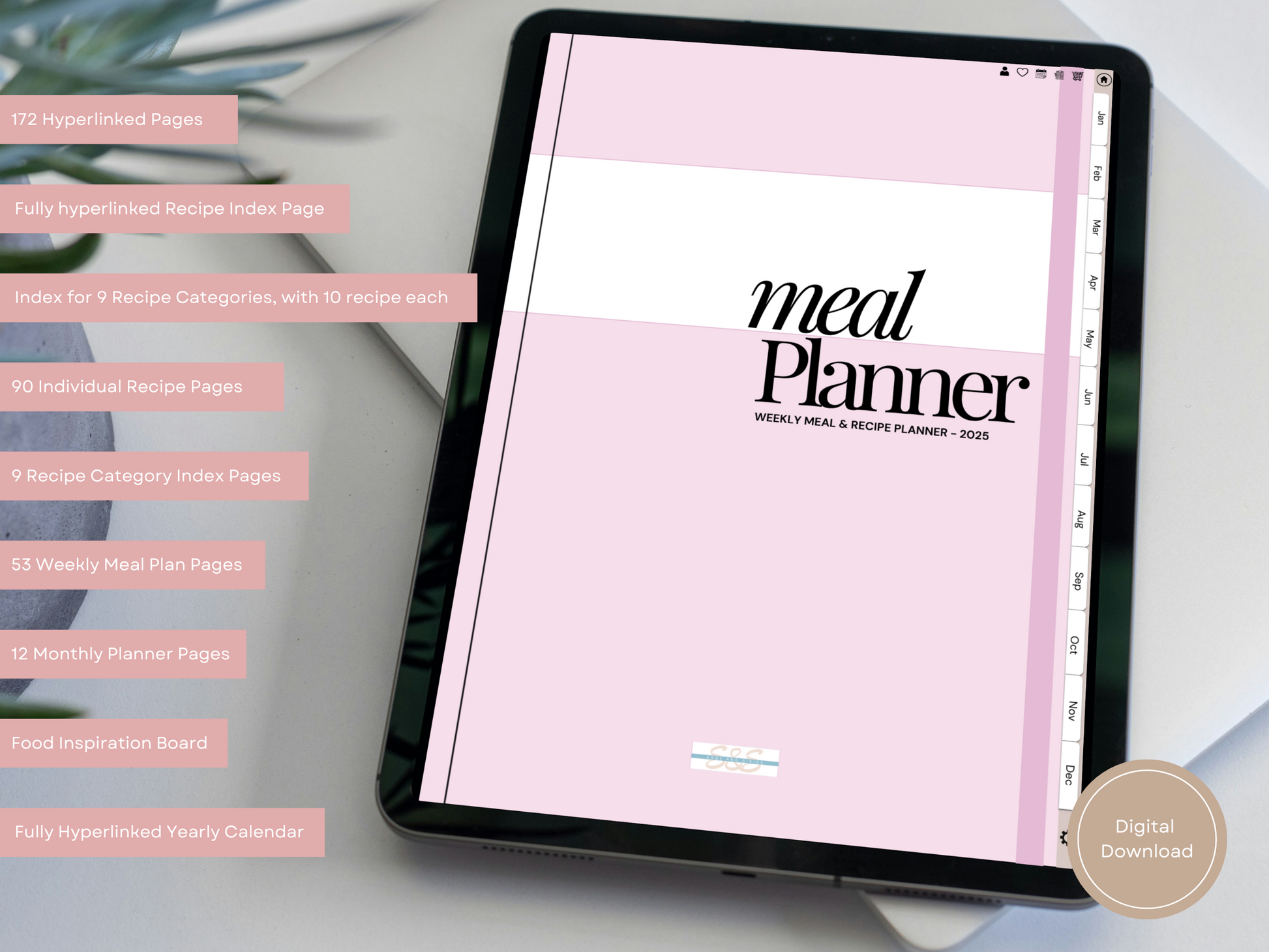 Digital meal planner open to the monthly planning page, placed on a coffee table with a cup of tea